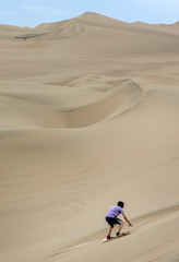 Fototapeta na wymiar Huacachina Peru. Desert. Dunes. Sand. Sandboarding