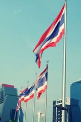 Thai flags on wind waving on the building.