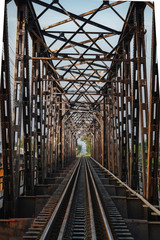 Internal view of the vintage , Metal railway bridge. in evening at Chulalongkorn Bridge Thailand. Perspective image background.