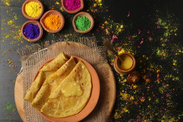 PopuIndian sweet bread known as Puran poli (Gram floor and jaggery stuffed bread), Dahi vada,...