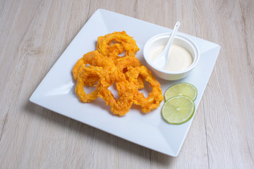 Squid with roman sauce and lemon batter