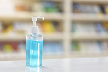 alcohol gel for hand wash On the white table in the library, classrooms and offices. protect herself from Corona virus or covit -19, Healthcare concept for safety. Soft selected focus