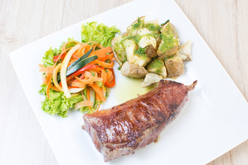 Premium Meat Cut   Beef Cuts - Sterling Silver, accompanied by vegetables and potatoes