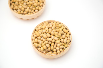 A pile of soybeans in a bamboo basket