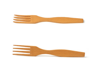 wooden yellow fork isolated on white background, vintage appliance