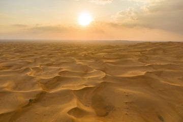 Aerial view of red Desert Safari with sand dune in Dubai City, United Arab Emirates or UAE. Natural...