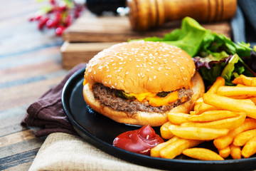 American cheese burger with Golden French fries
