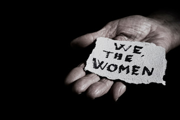 senior woman and the text we the women.