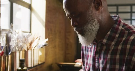 Chef smelling a cream