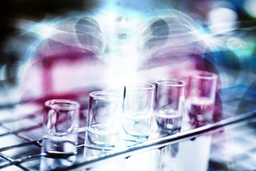 Double exposure test-tube coronavirus analysis concept in laboratory.