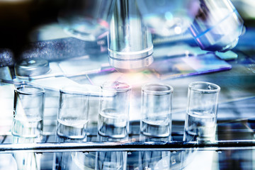 Double exposure test-tube coronavirus analysis concept in laboratory.