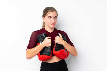 Sport teenager girl over isolated white background with boxing gloves