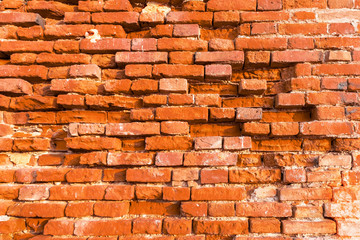 Orange-coloured brick wall with depth difference