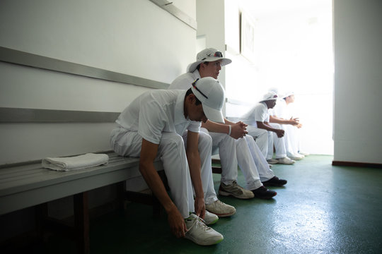 Cricket players preparing to play