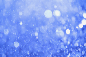 Blue glitter bokeh of light.Abstract blurred light