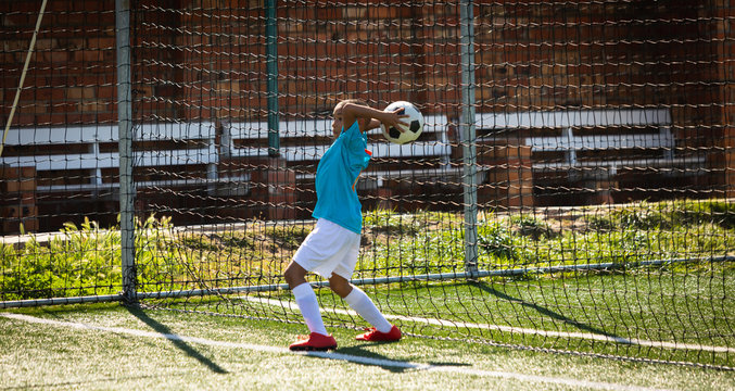 View of the goalkeeper with the ball in his hands