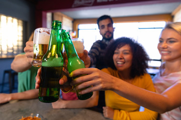 Friends having fun together while drinking