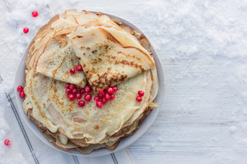 homemade pancakes with red currants on Shrovetide