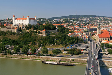 Obraz premium Landscape of Danube river and Bratislava castle - main castle of Bratislava, the capital of Slovakia