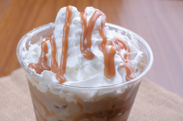 Coffee milkshake, with chantilly cream and arequipe sauce