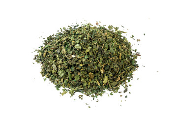 dried nettle herb or in latin Utricae folium heap of isolated on white background. medicinal healing herbs. herbal medicine. alternative medicine