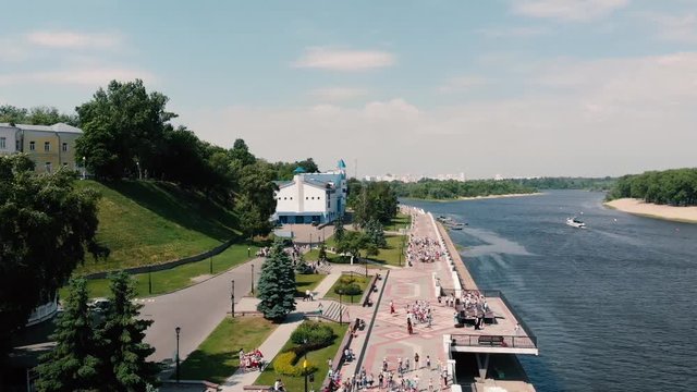 Many children on the embankment of the Sozh River from a bird's eye view