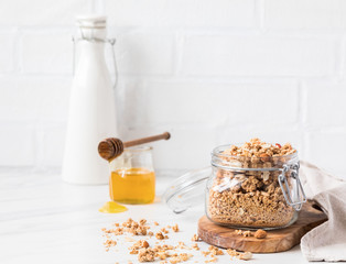 Granola, muesli with vegetable milk and honey. Breakfast, snack.Concept of healthy