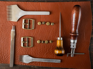 Fototapeta premium Production of genuine leather. Instruments. Genuine leather design. Metal fittings. Clothing industry.