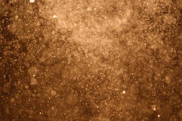 Golden glitter bokeh of light.Abstract blurred light