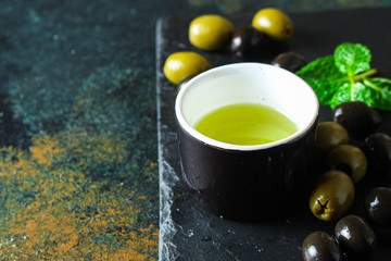 Fototapeta na wymiar olive oil appetizer olives, cold pressed, menu concept food background. top view. copy spaces