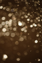 Golden glitter bokeh of light.Abstract blurred light