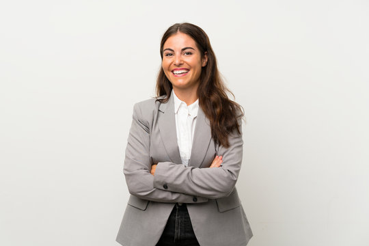 Young business woman over isolated white background laughing