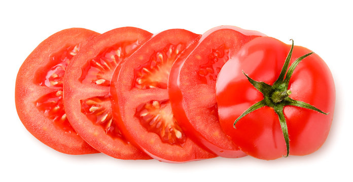 Ripe tomato cut into rings on a white background. The view from top