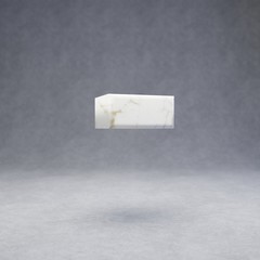 White marble minus symbol on concrete background