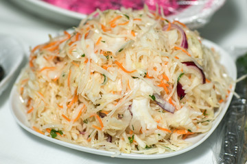 fresh pickled cabbage german sauerkraut with ingredients in bowl