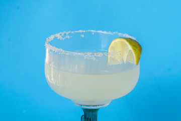 Margarita drink with tequila and lime for a refreshing cocktail.