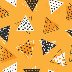 Geometric seamless pattern made of triangles. Decorated with circles and lines. Hand-drawn background. Modern design.