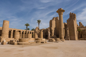 Karnak Temple, Colossal sculptures of ancient Egypt in the Nile Valley in Luxor, Embossed hieroglyphs on the wall.