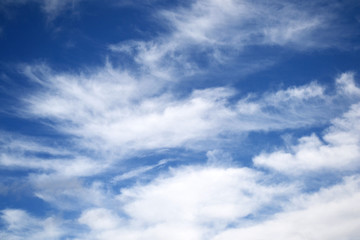 Fluffy white clouds on a beautiful blue sky