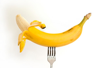 Banana on a metal fork