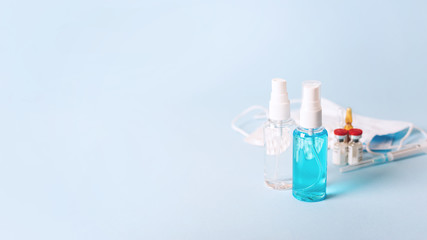 Prevention and Treatment of Novel Coronavirus COVID-19 disease concept. Alcohol-based hand sanitizer, Medical mask, capsules, drugs medicines, injection for 2019-nCoV Coronavirus treatment