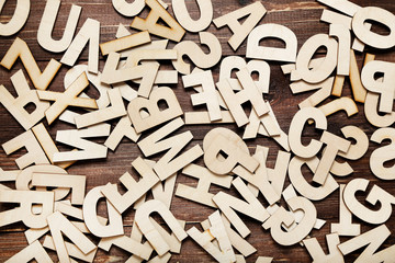 Wooden letters on brown table