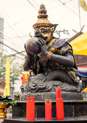 Chi Chi Sticks Used to predict the future To the Rahu statue At Huai Khwang market, Bangkok, Thailand