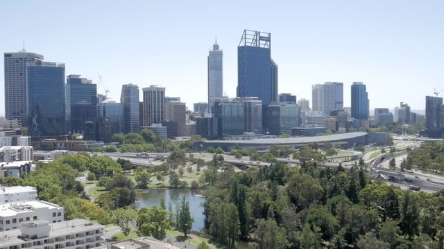 The photographer takes a photo of Perth City from Kings Park in Slo Motion