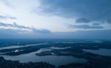 Beautiful panoramic aerial view of the Dnieper River and the North Bridge or Moscow Bridge from the left bank.