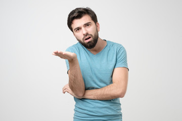 Young hispanic man is angry quarrel with his wife over her credit card spending