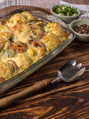 baked cauliflower with cheese and mushrooms.