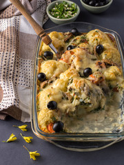 baked cauliflower with cheese and mushrooms.