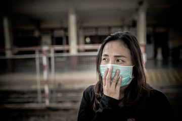 Asian traveler woman wear mask for protect coronavirus,Thai woman wearing face mask respiratory...