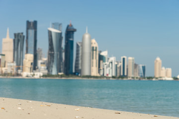 Fototapeta premium View of city center with skyscrapers from the Beach in Doha, Qatar